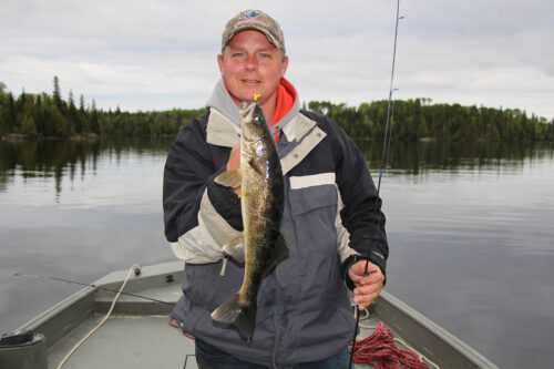 Fisherman with Awesome Walleye Catch