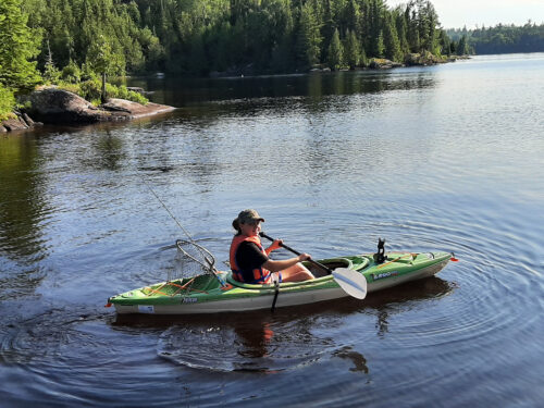 Girl Kayaking on Dog Lake